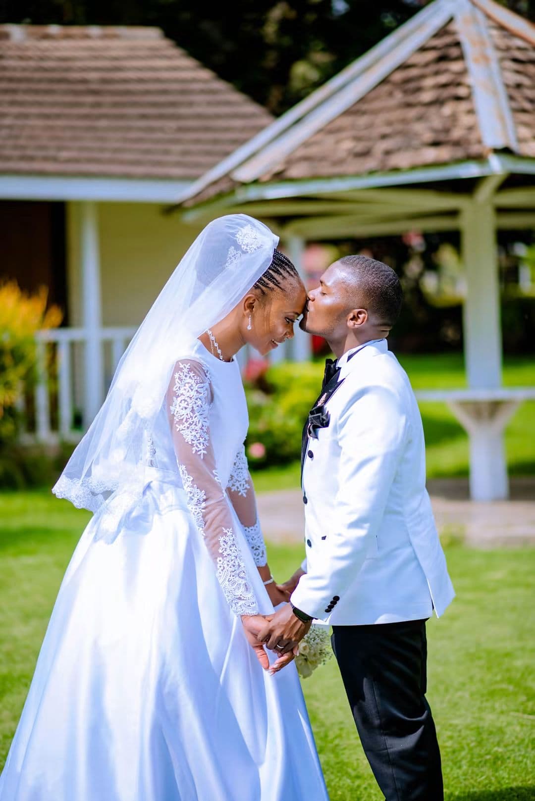 Bride and groom holding hands on their wedding day